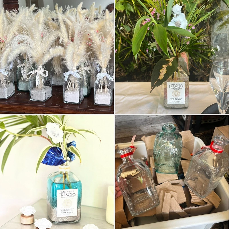 Bouteilles en verre Baie des Trésors utilisées comme soliflores ou vases décoratifs lors d'événements